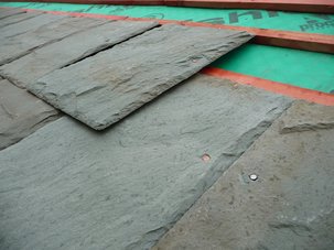 The wonderful new slates going up on the Nave and South Aisle roofs.